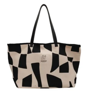 Bolso KORISSIA con broche — blanco y negro